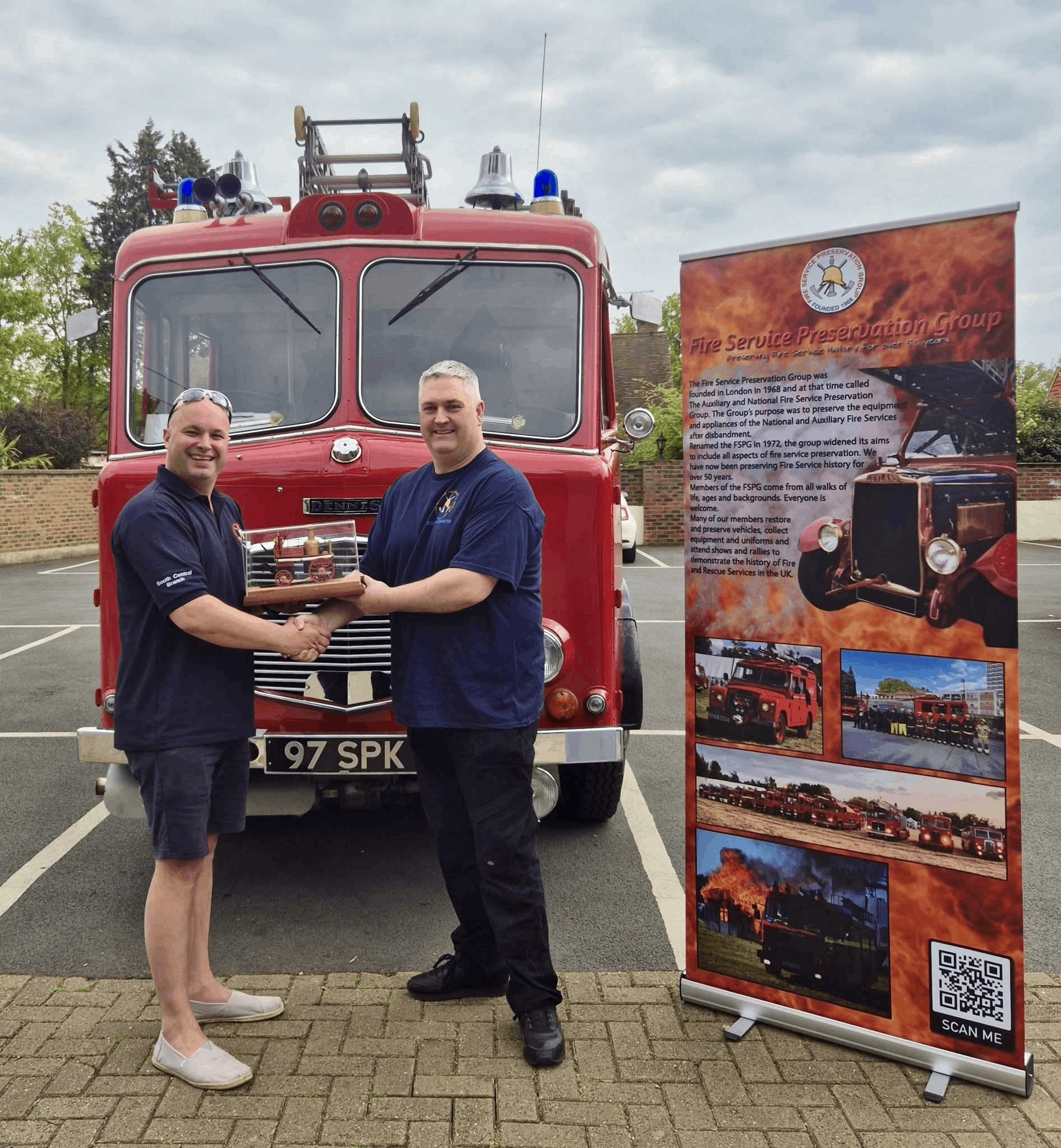 2022-2025 Chairman Terry Prince giving the Member of the Year award to Jon Bickers.